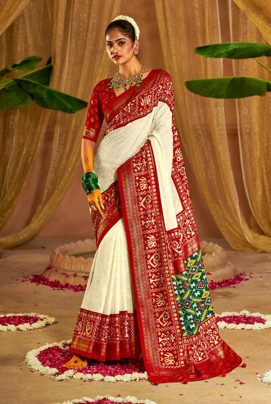 Traditional White & Red Patola Inspired Saree with Rich Woven Border