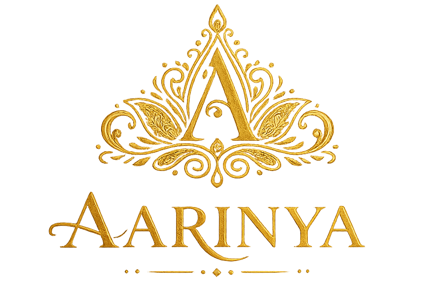 Gold decorative logo with 'Aarinya' text on a white background