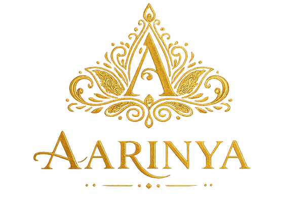 Gold decorative logo with 'Aarinya' text on a white background
